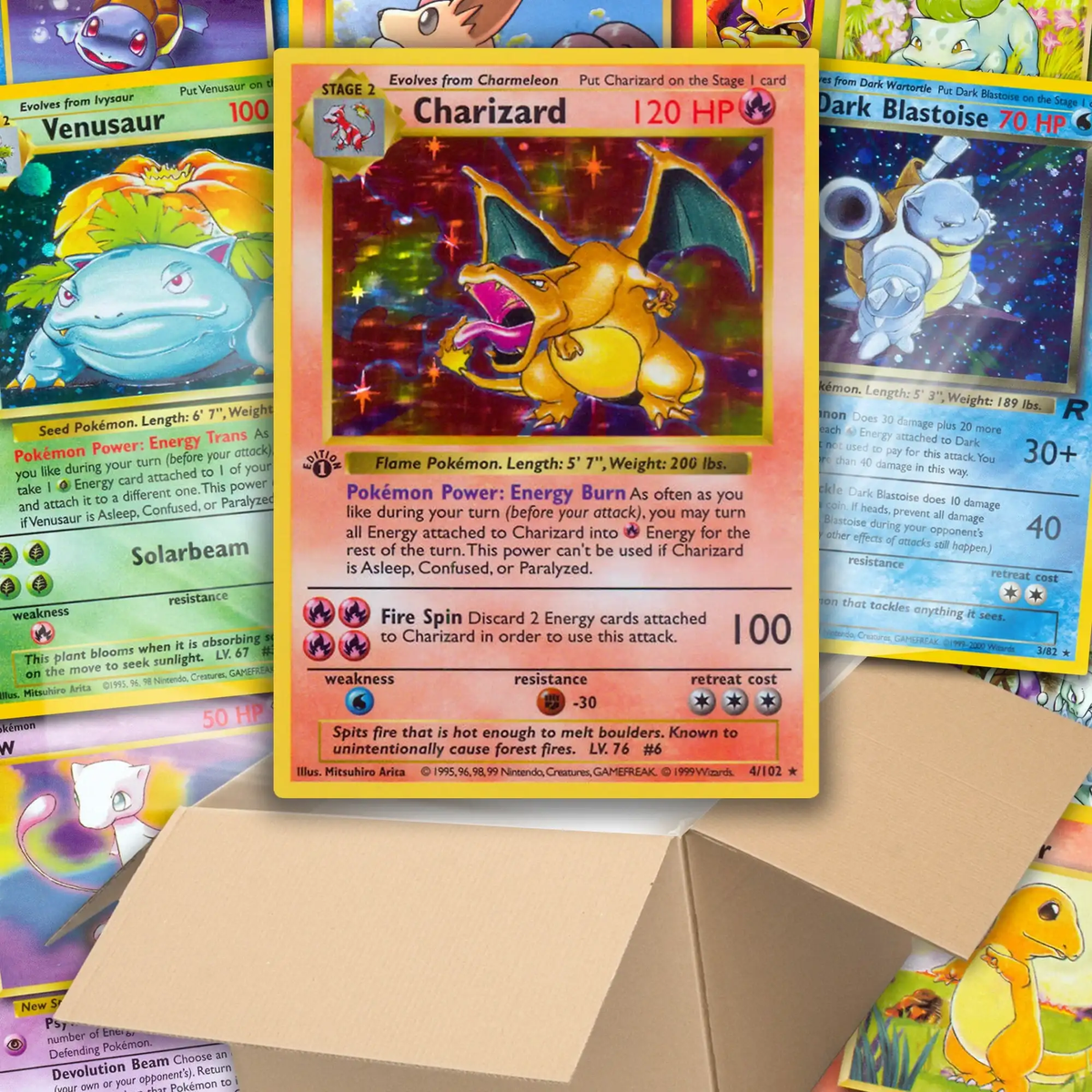 Vintage Pokémon cards, including Charizard, Venusaur, and Blastoise, displayed above an open box from PTC Collectibles.